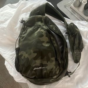 Eddie Bauer NWOTcamo crossbody with multiple pockets and bungee to carry more